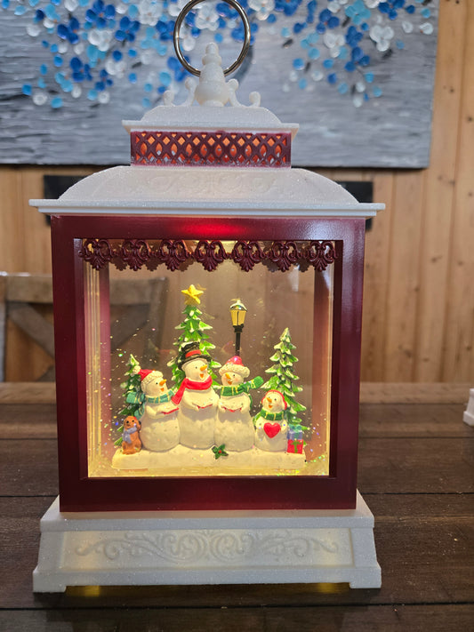 A G670 SNOWMEN Lighted Spinning Water Globe Lantern